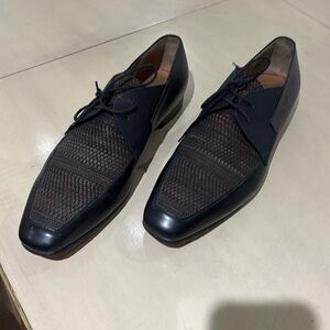Never worn perfect condition black and brown loafer. Size 44